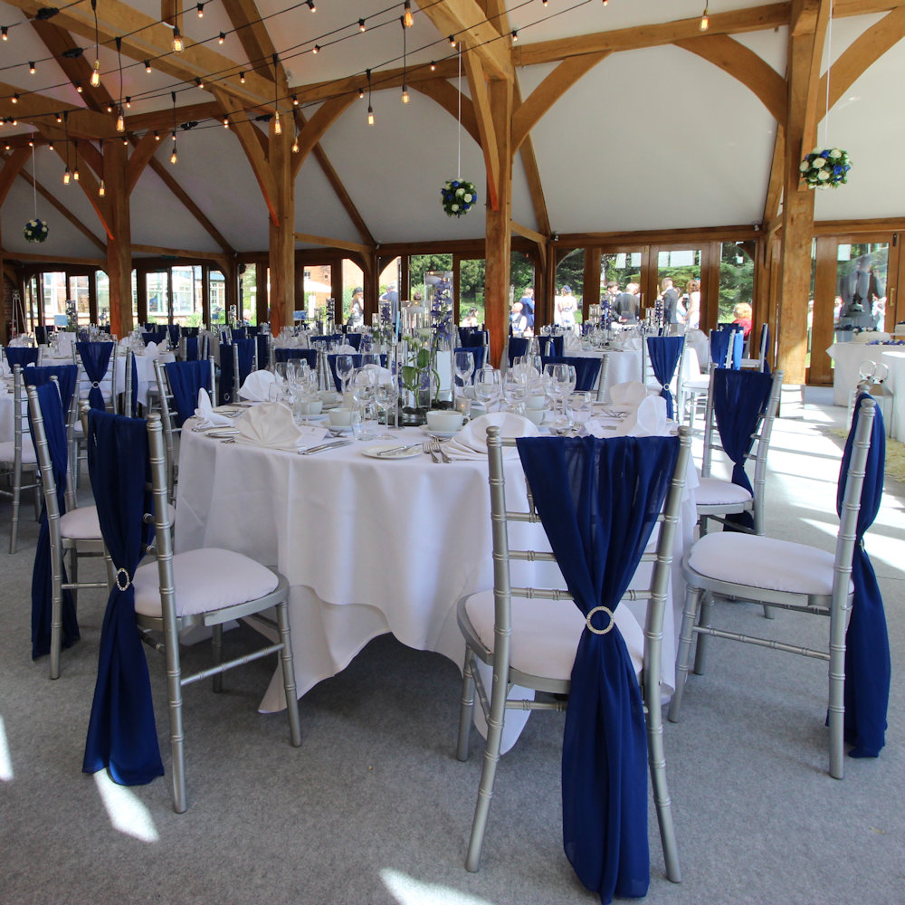 Royal Blue Chiffon Chair drape at Brocket Hall