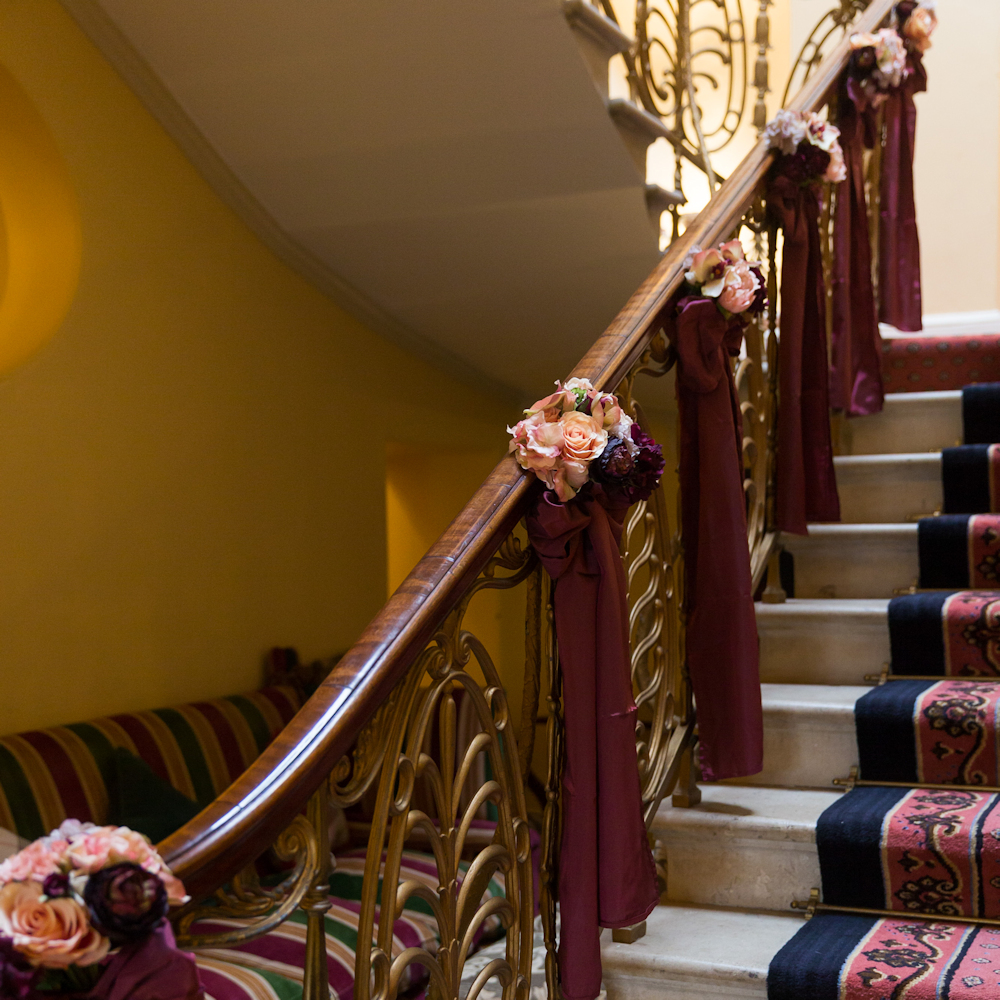 Brocket Hall Main House Stairs with flowers and bows