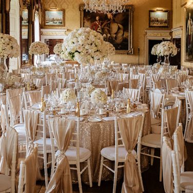 Brocket hall champagne vertical drape on white chiavari chairs