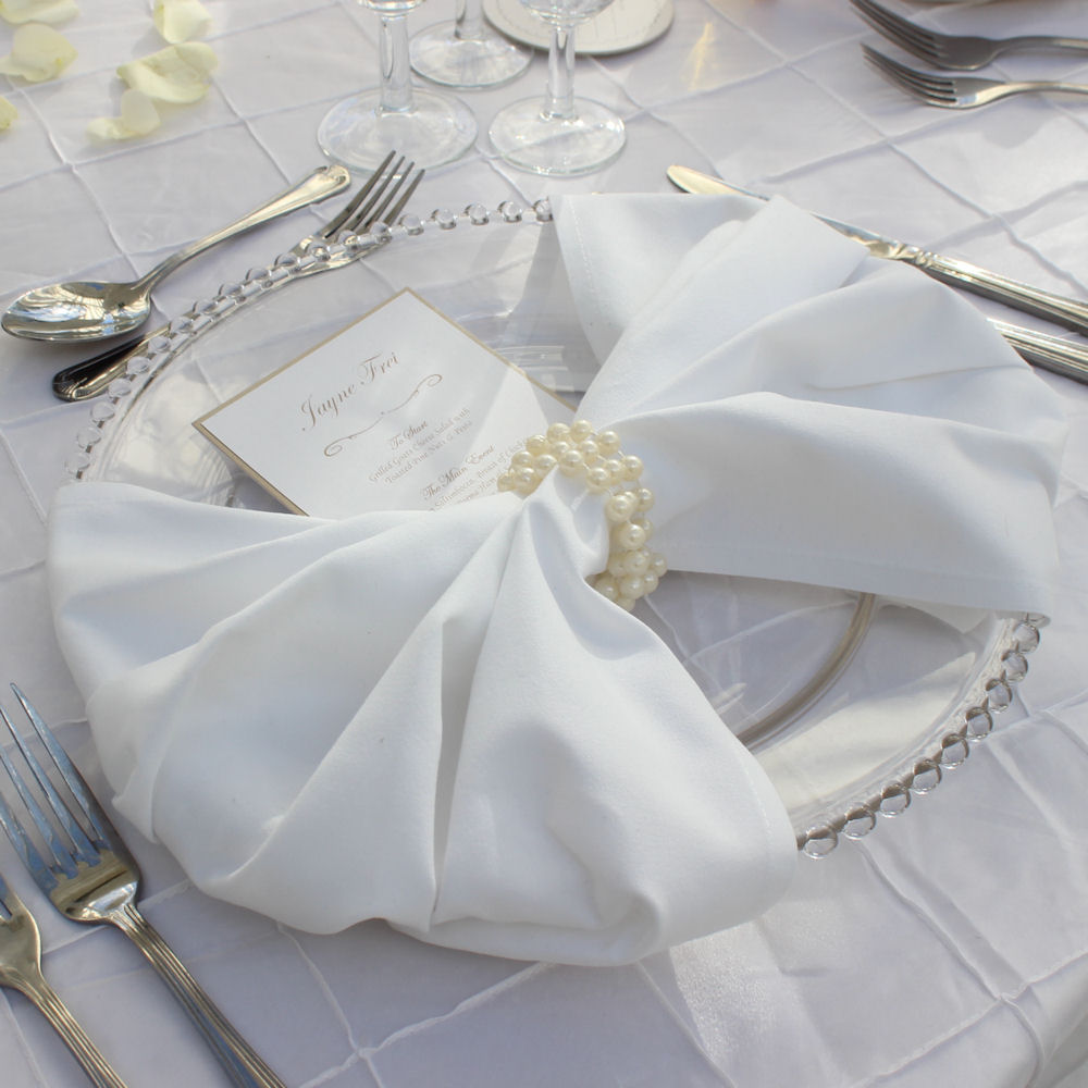 Clear Beaded Charger Plate on White Pin Tuck Tablecloth with Pearls & Fan Napkin