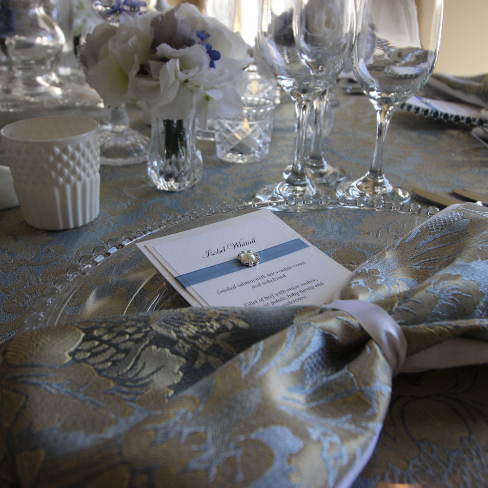 Clear Beaded Charger Plate with Gold and Dusky Blue Damask Tablecloth