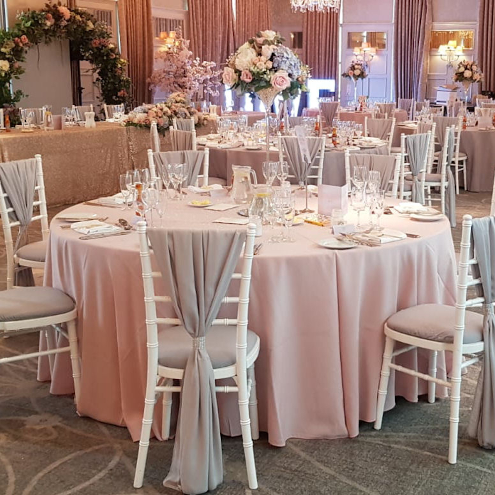 Deverer latimer grey vertical drapes on white chiavari chairs
