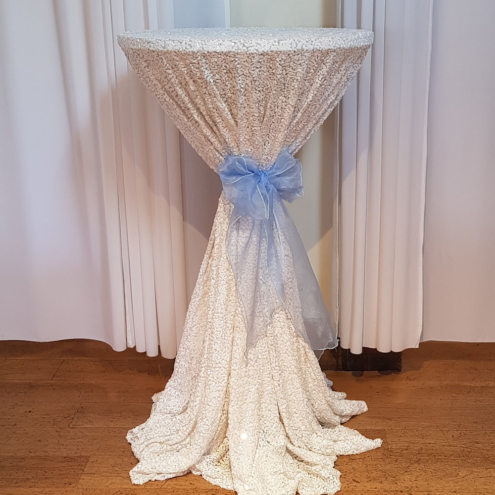 White Sequin Poseur Table with Blue Bow at Gaynes Park