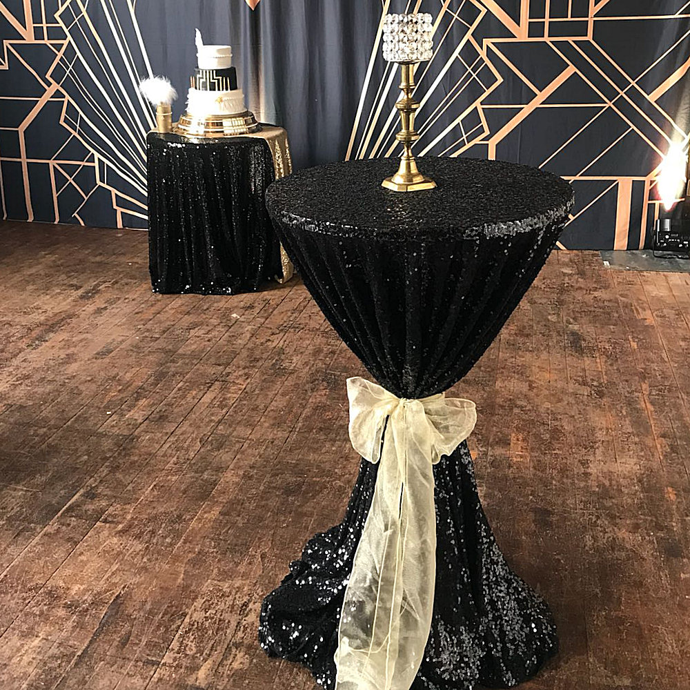 Black Sequin Poseur Table with Gold Bow at Gatsby Party