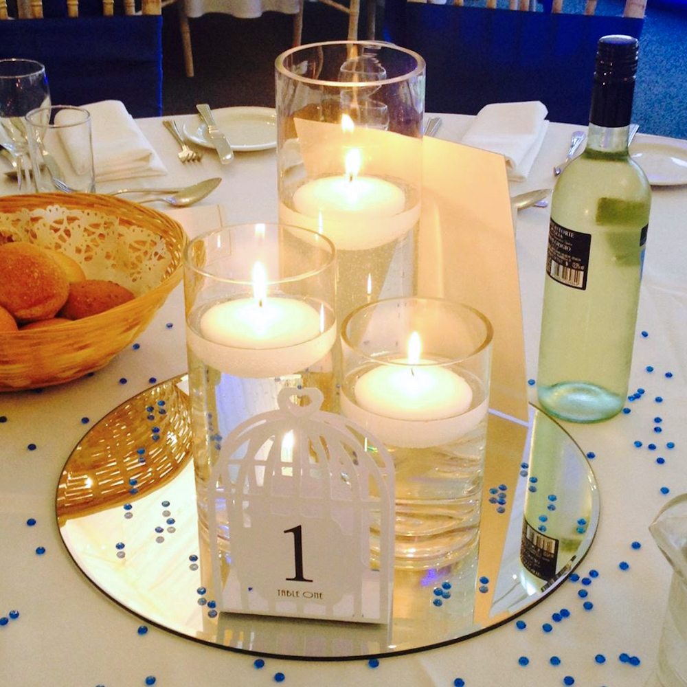 3 Floating Candles in Cylinder Vases