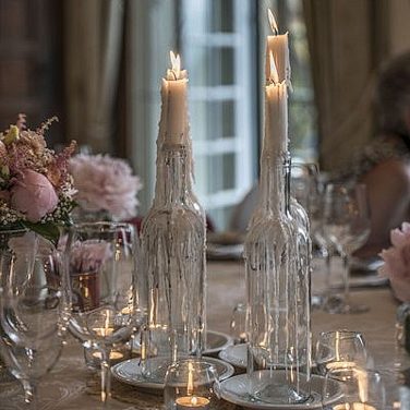 Clear Wax Covered Bottles with Candles
