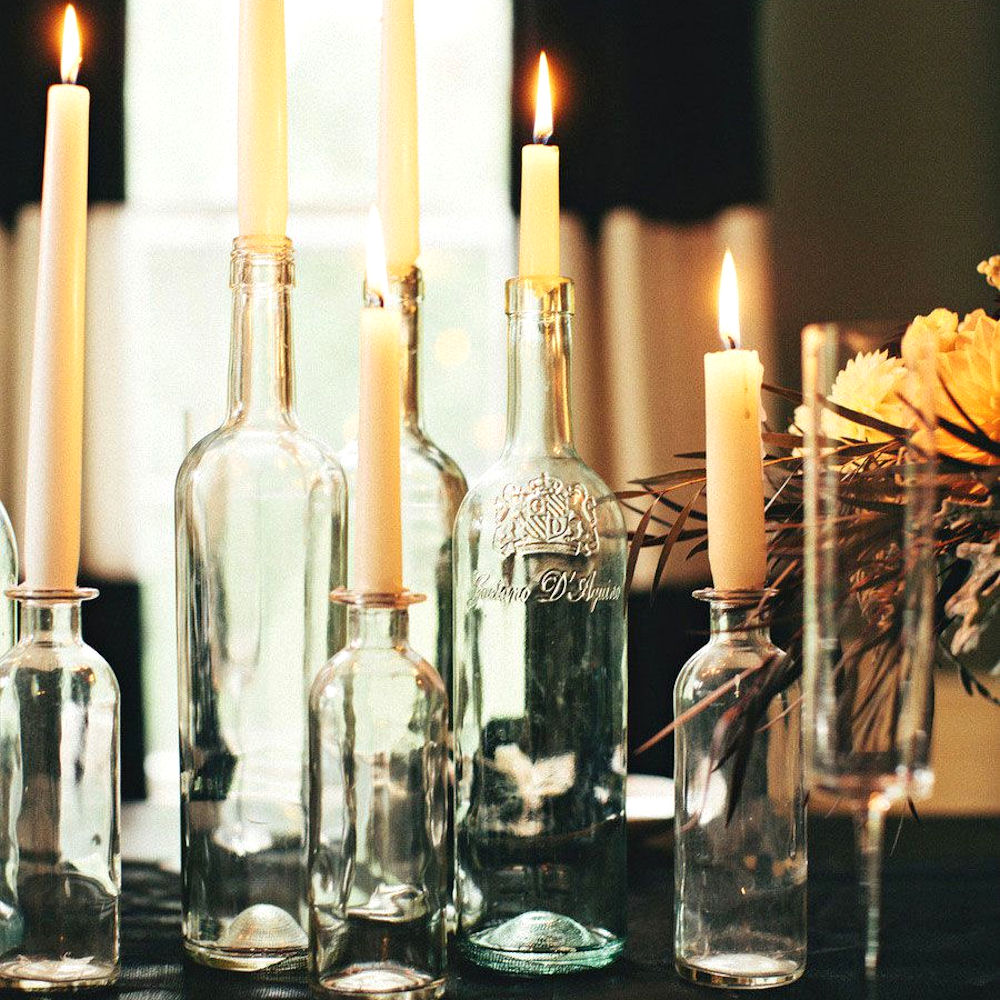 Glass bottles clear real tapered candles centrepiece