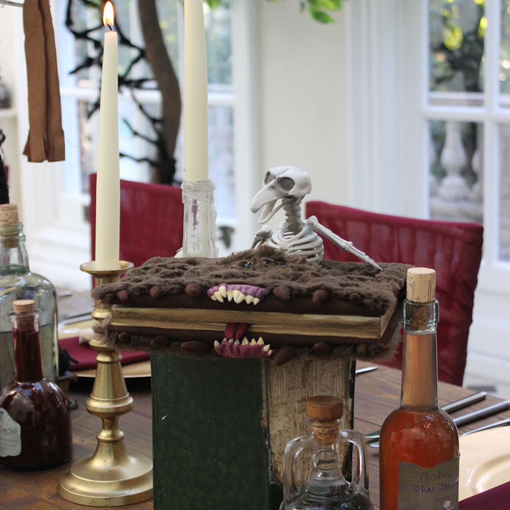 Gold Candle Stick on Harry Potter Table