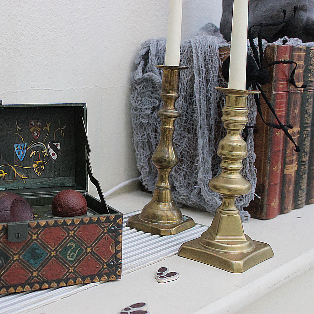 Gold Candle Stick on Harry Potter Table