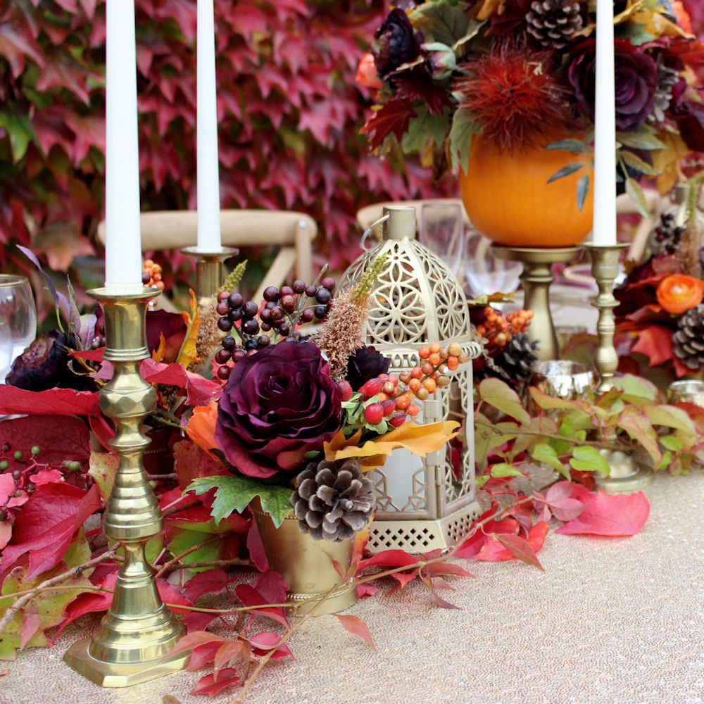 Gold Brass Candlesticks on Autumn Table