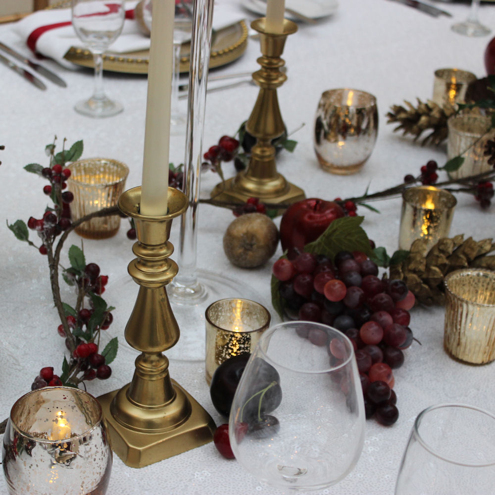 Gold Brass Candlesticks on Christmas Table