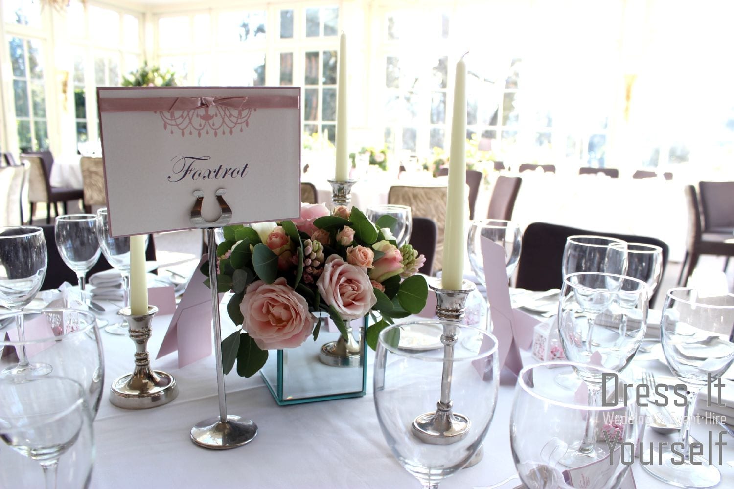 Mirror Cube Vase Hire with Pink Flowers