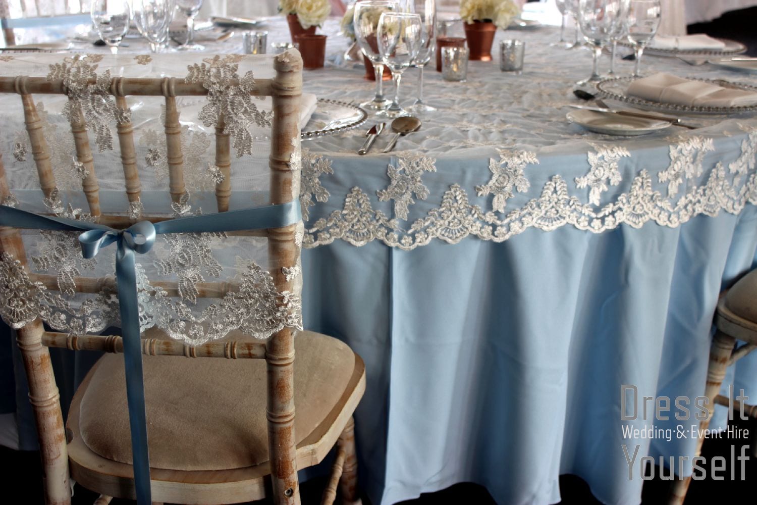 Lace chair cap with blue ribbon