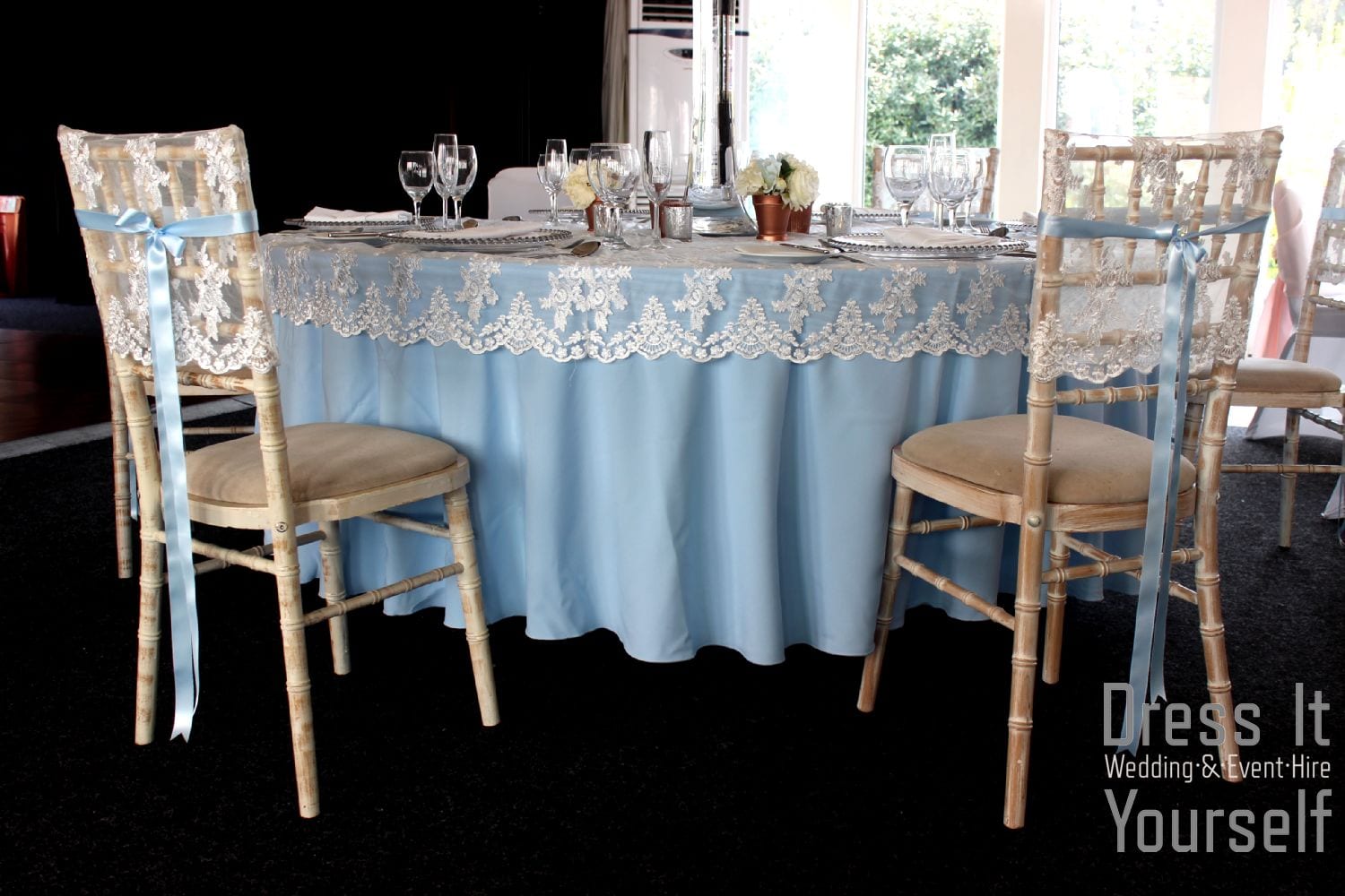 Lace chair cap with blue ribbon