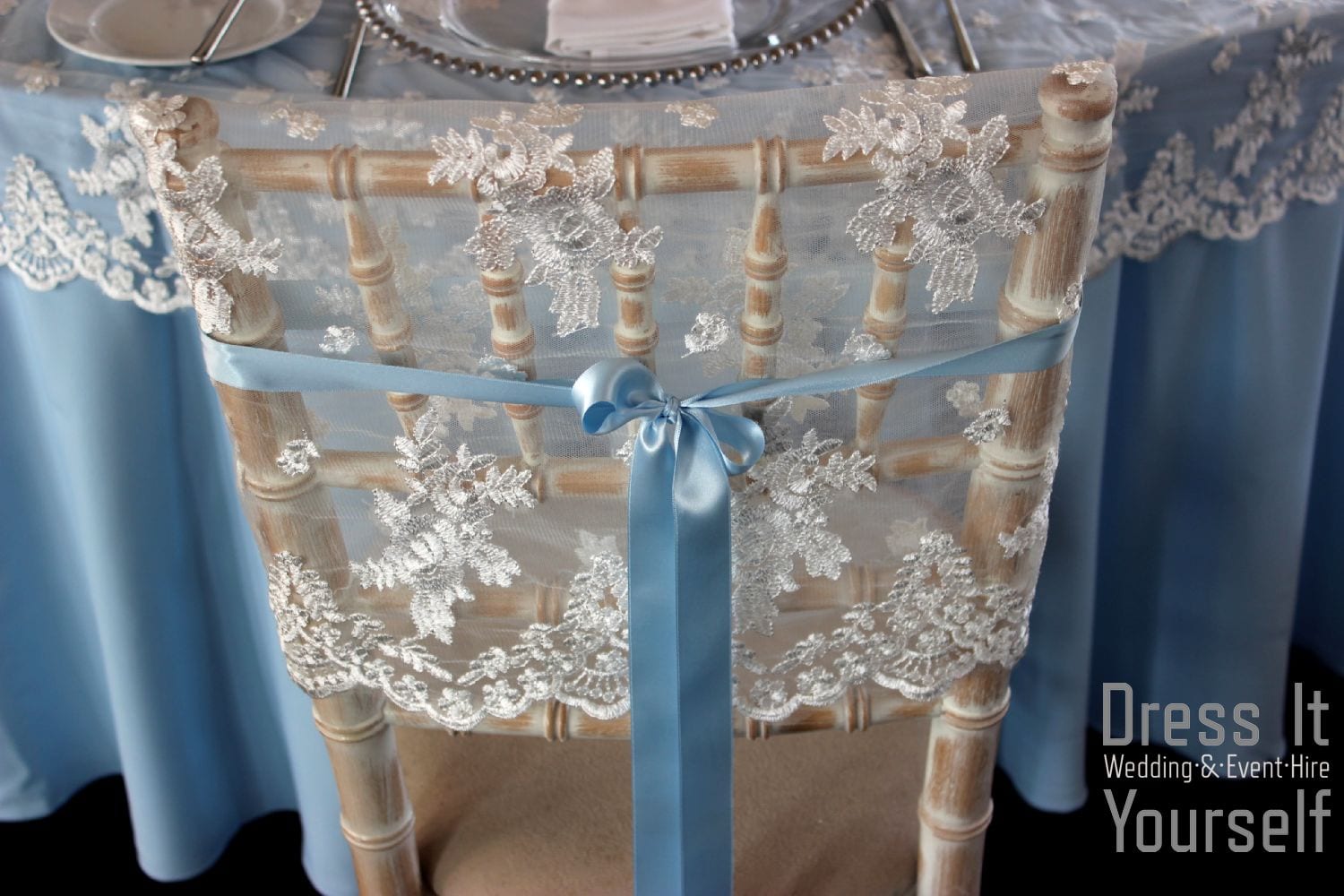 Lace chair cap with blue ribbon