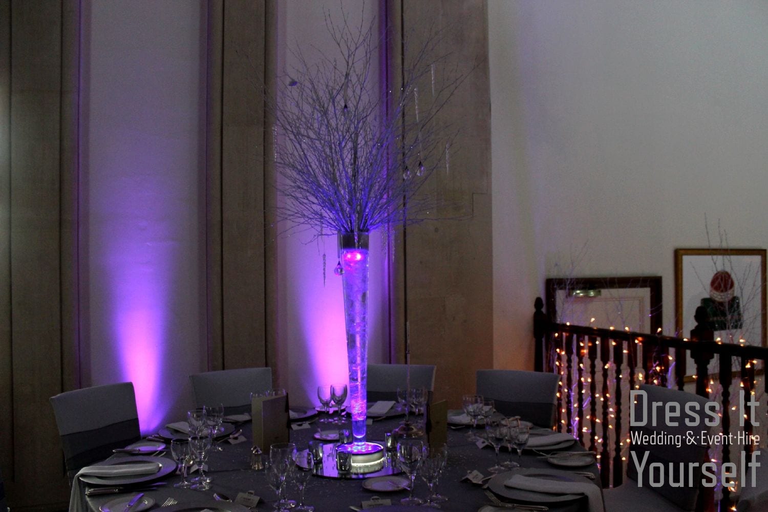Flute Vase with Sticks and Purple LED
