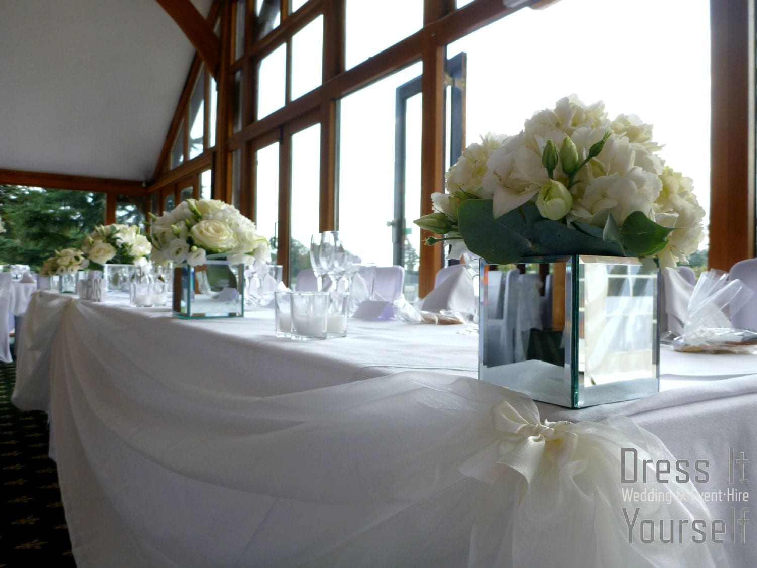 Mirror Cube Vase Hire with Ivory Flowers