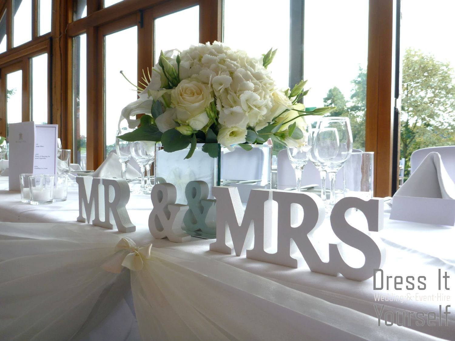 Mirror Cube Vase Hire with Ivory Flowers
