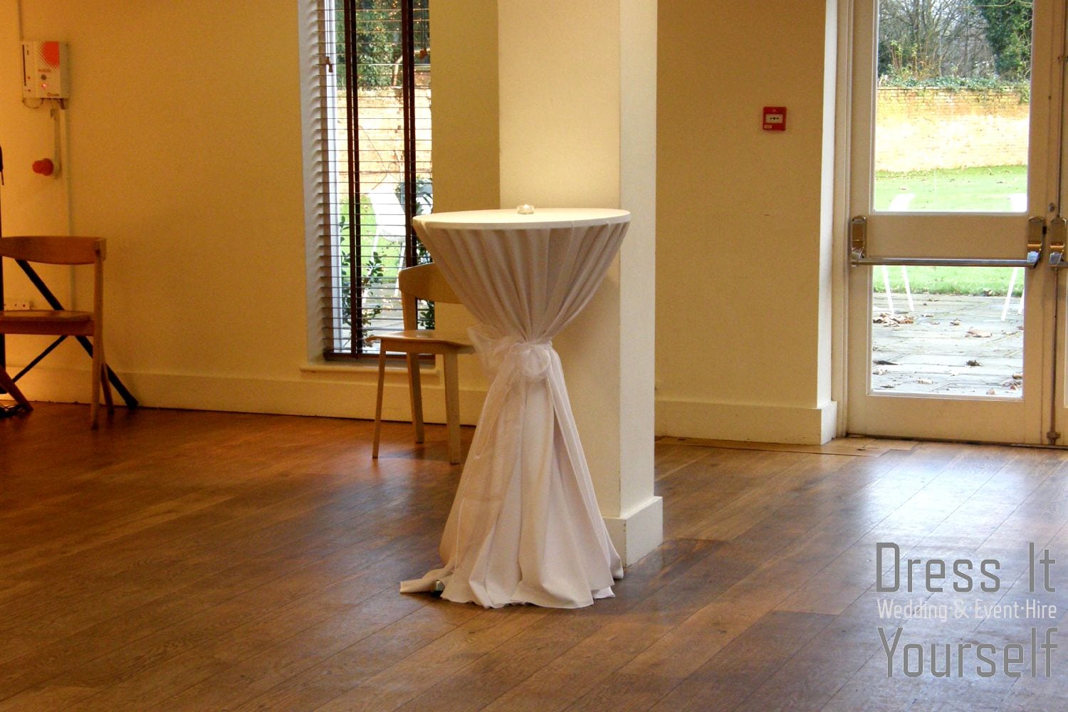 Poseur Table with White Cloth