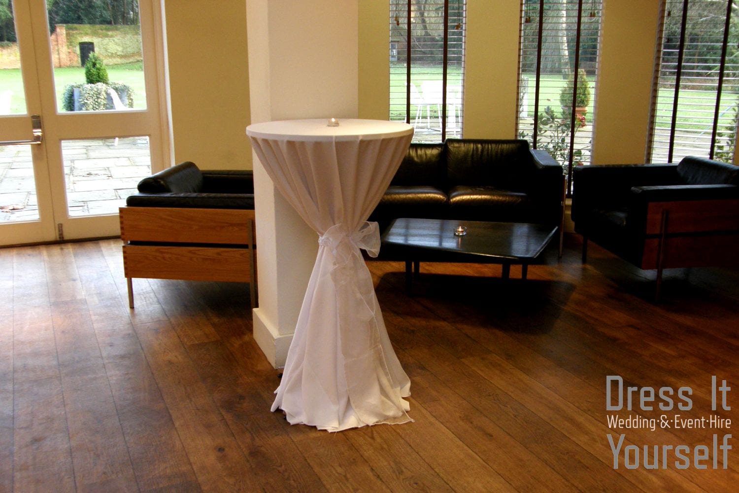 Poseur Table with White Cloth