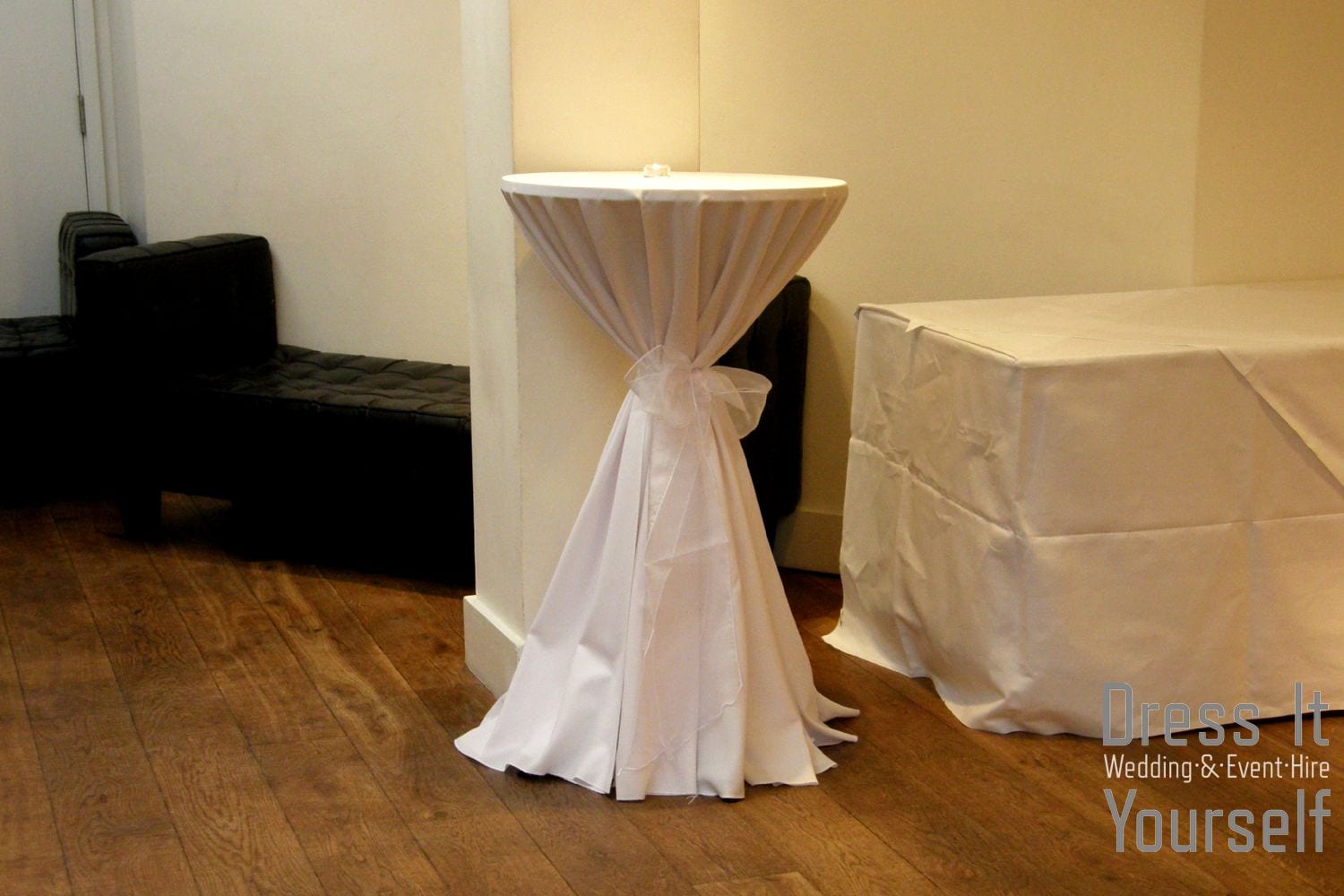 Poseur Table with White Cloth