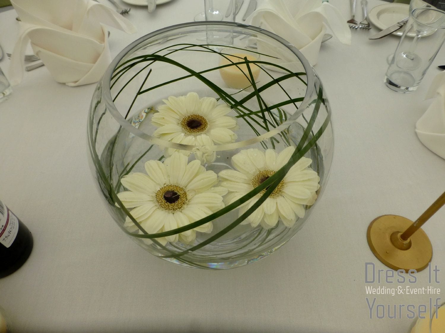 Fish Bowl with Gerberas and Bear Grass
