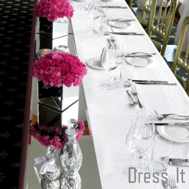 Mirror Cube Vase Hire with Cerise Carnations