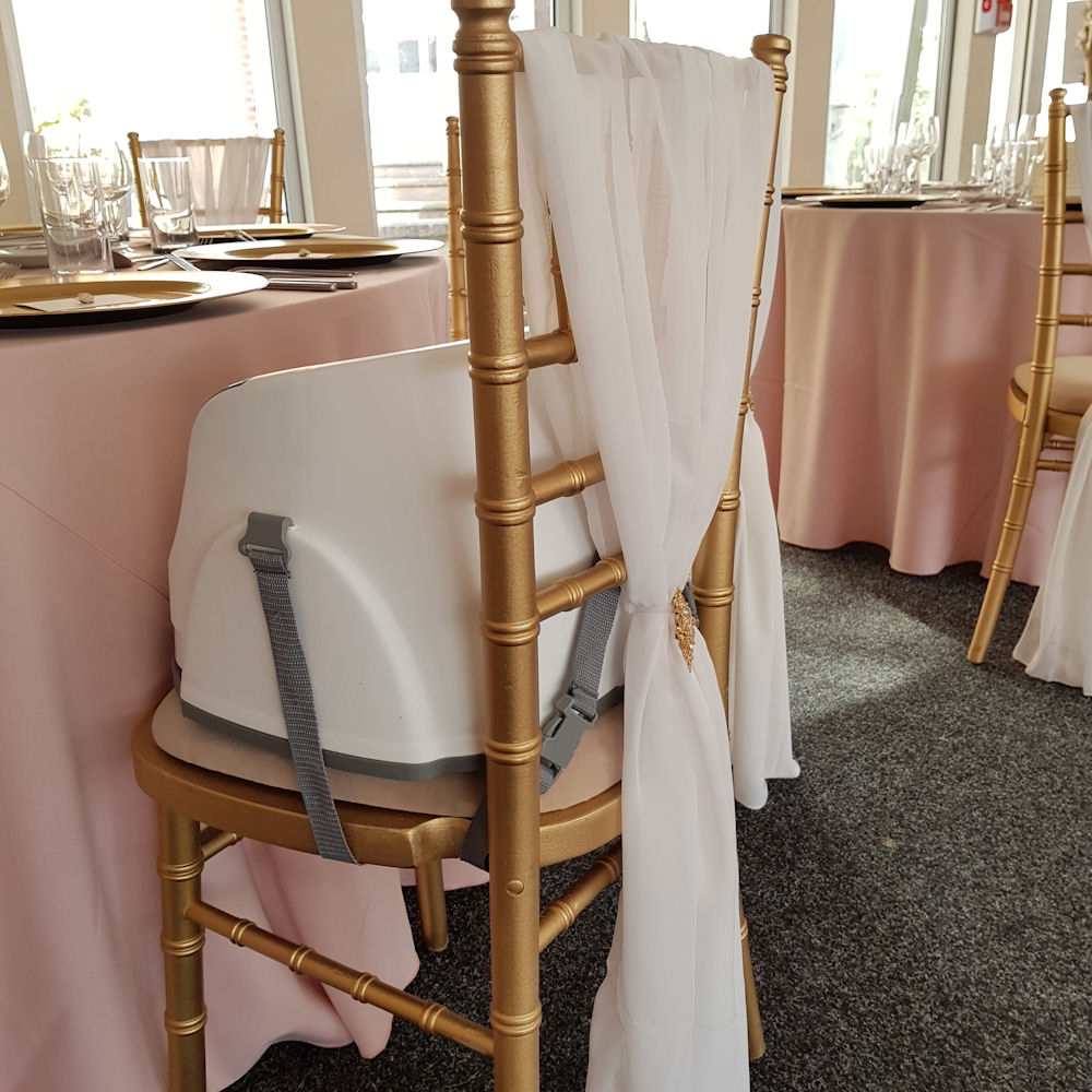 White Booster Seat on Chiavari Chair