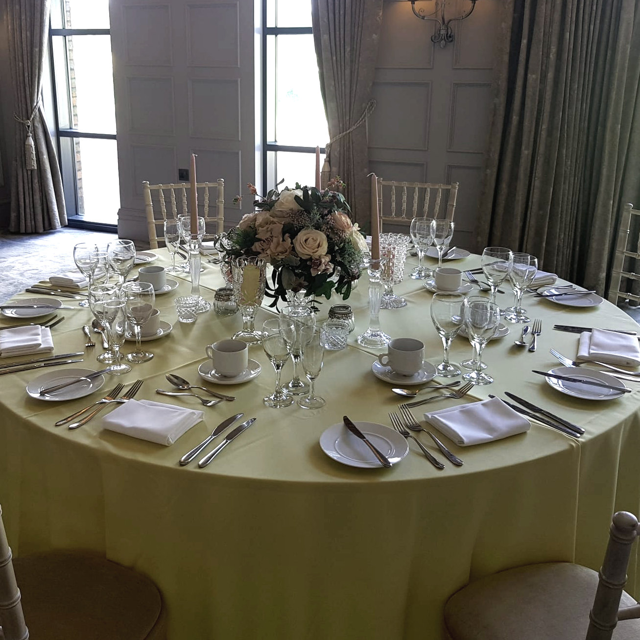 Baby Yellow tablecloths at Dever Laitmer with silk flowers