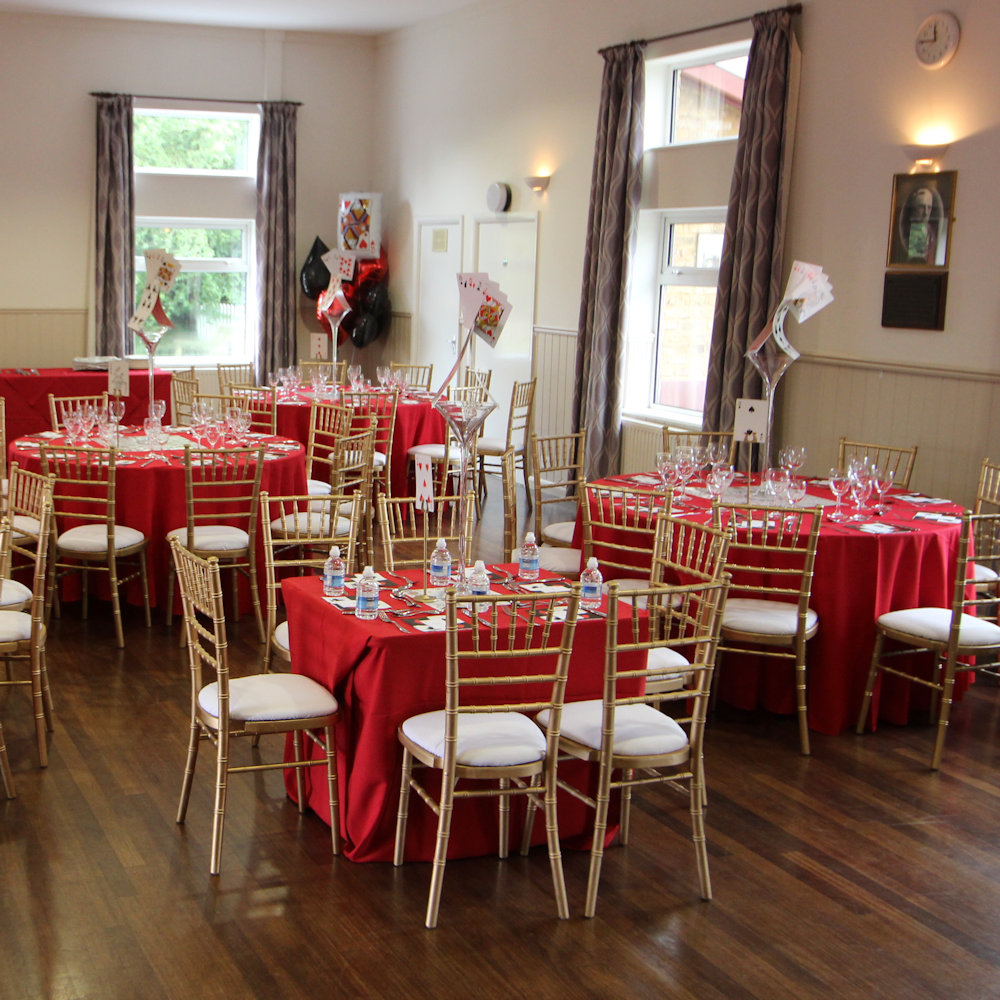 Gold Chiavari Chairs with Red Tablecloths