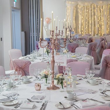 Dusky Pink rose gold candleabras chair covers white fairy light backdrop aubrey park (2)