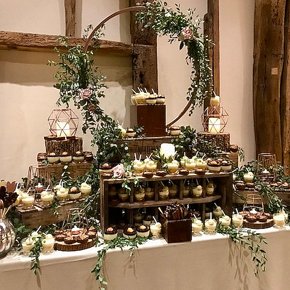 Geometric Candle Holders on Rustic Dessert Buffet with Foliage Ring