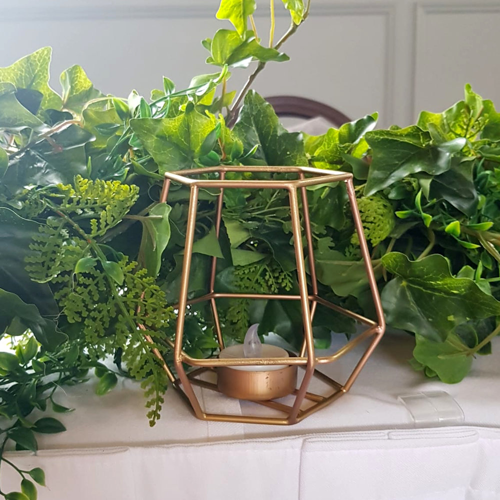 Geometric Tea Light Holders on Top Table with Eucalyptus Garland
