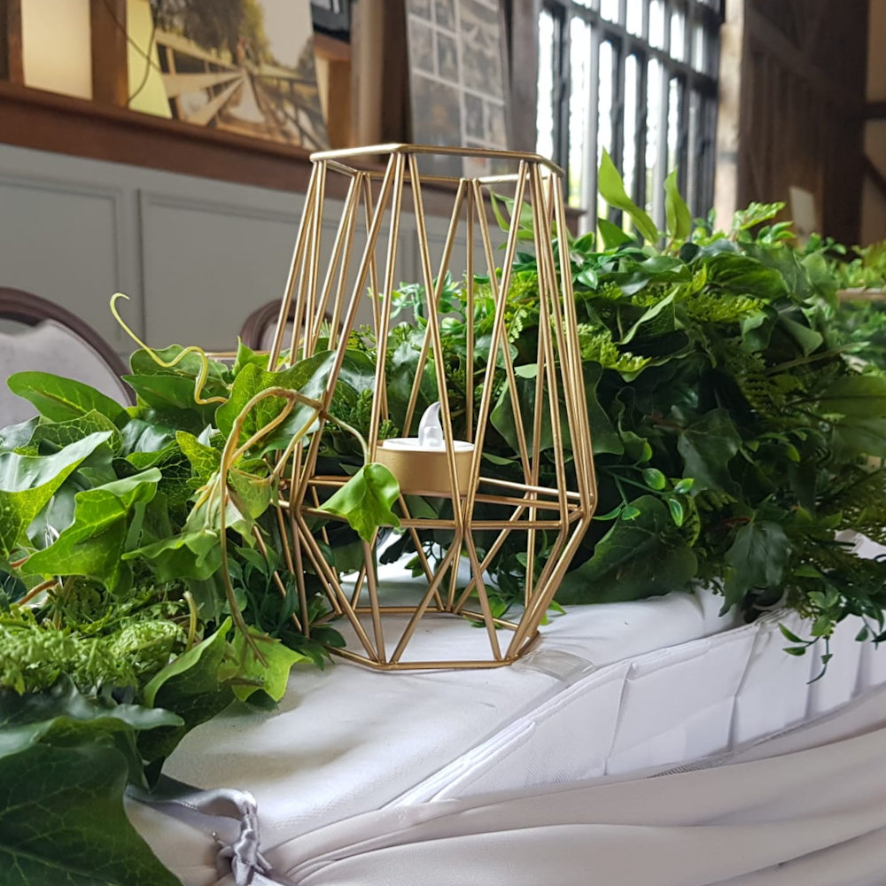 Geometric Candle Holders on Top Table with Eucalyptus Garland