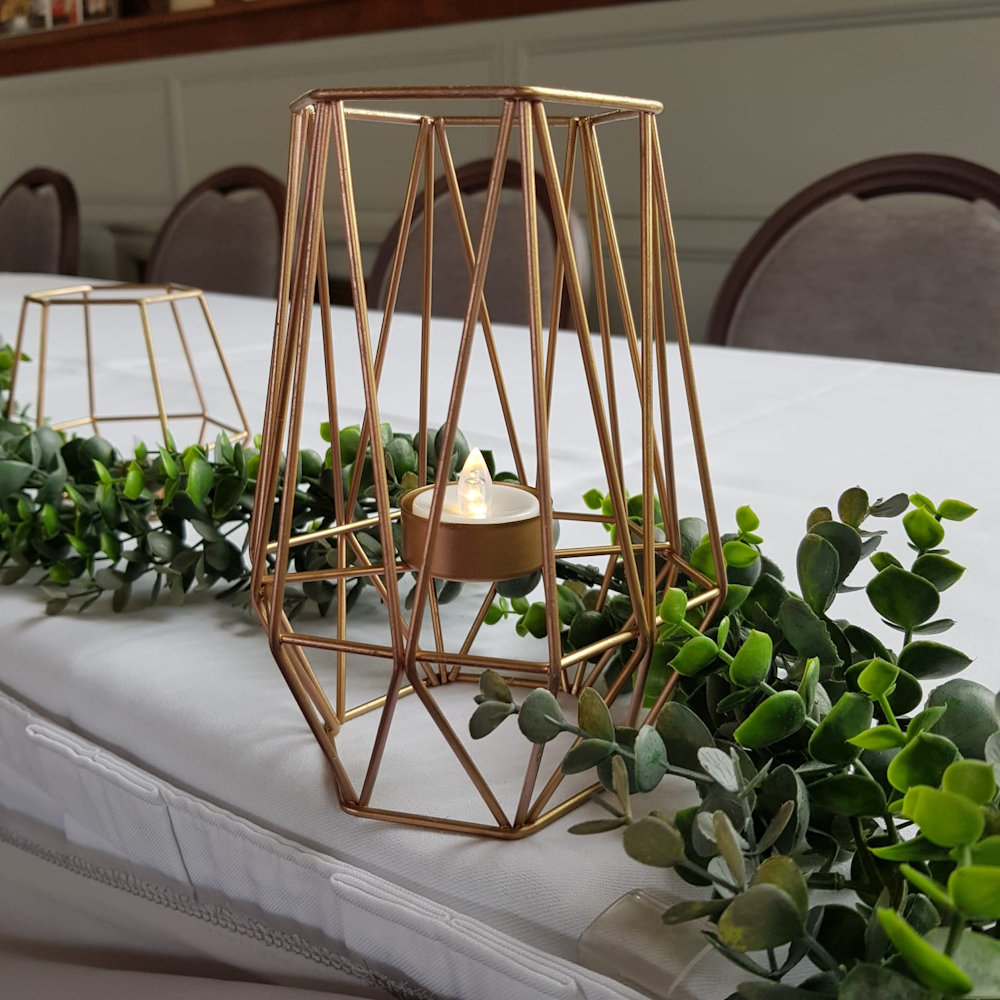 Geometric Candle Holders on Top Table with Eucalyptus Garland