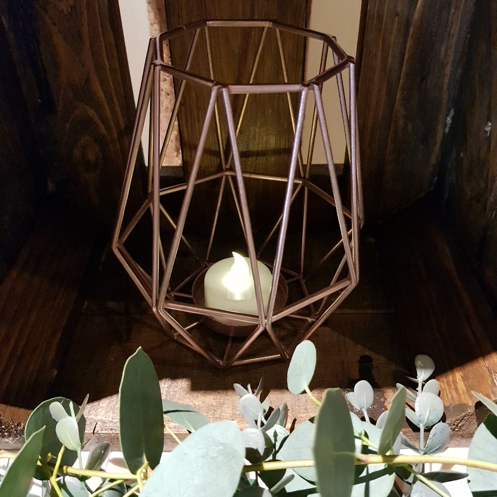 Geometric Candle Holders on Top Table with Eucalyptus Garland