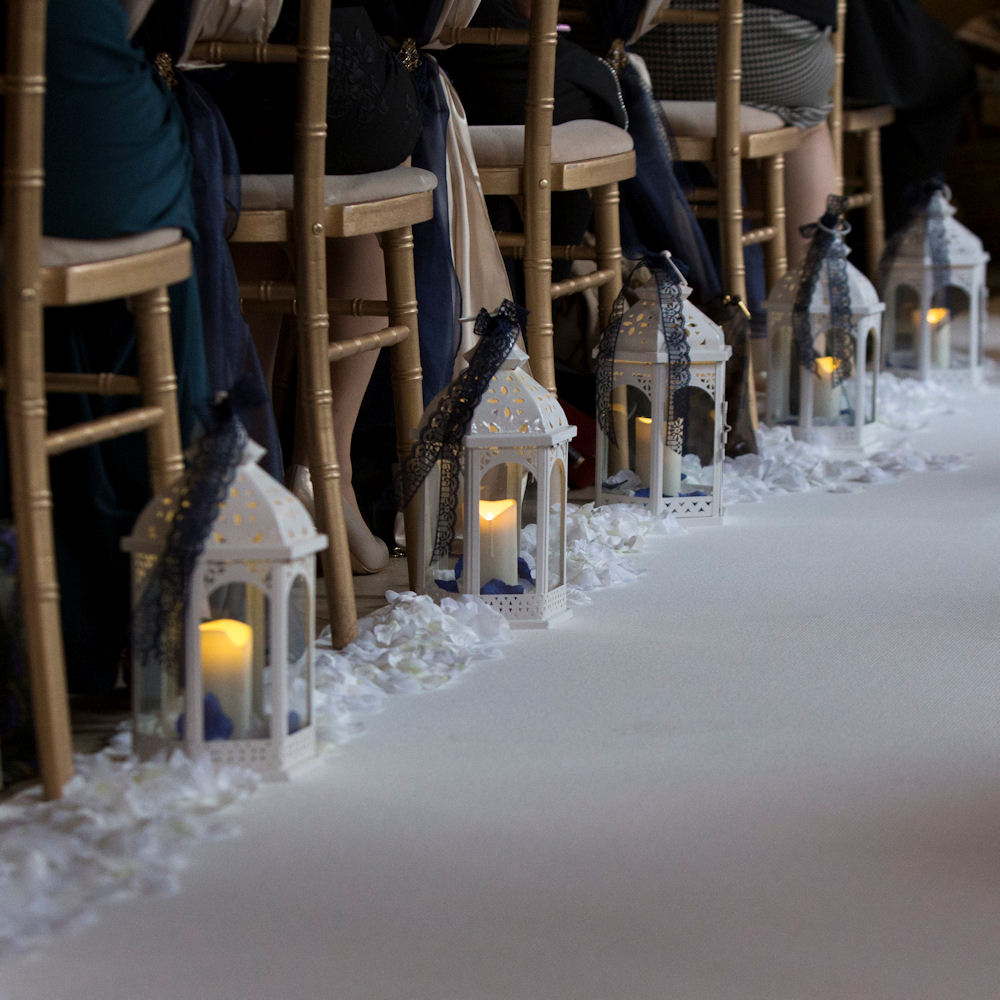 Ivory Vintage Lantern with LED Pillar Candles & Petals down aisle 2