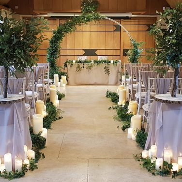 Mixed Foliage garland on Aisle Floor with LED Candles