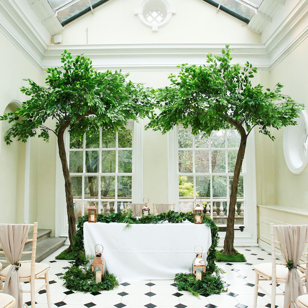 Arch floor standing tree gold sofas stage