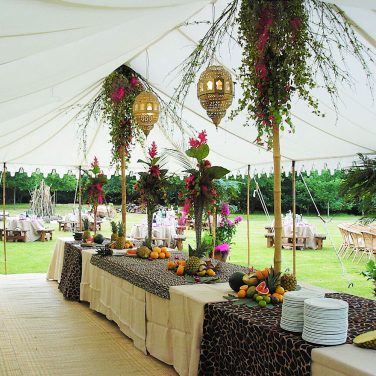 Tropical Flower Centrepiece with Leopard Print Vase & Fruit