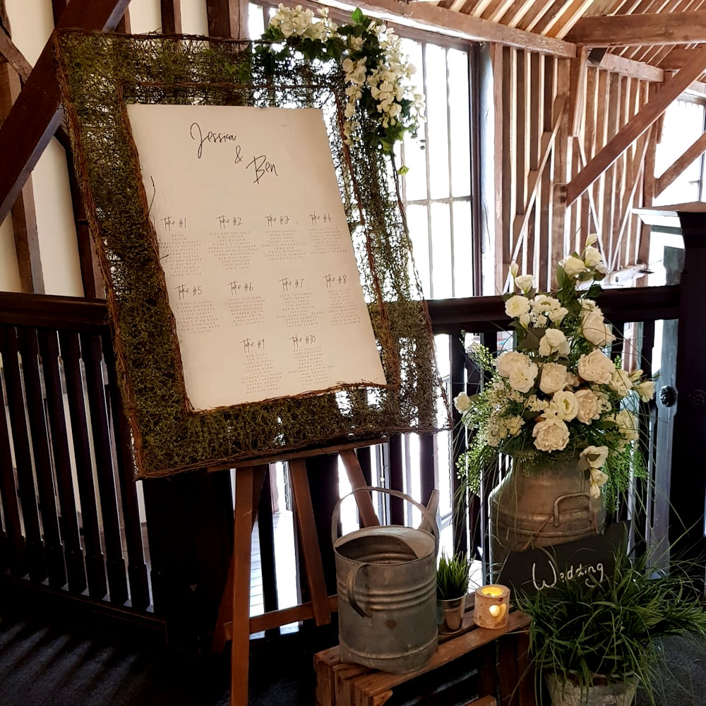 Moss Frame at Wedding with Garden Themed Items