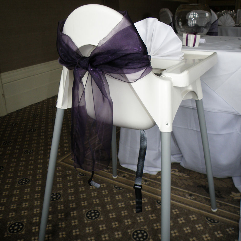 White High Chair with Dark Purple Bow