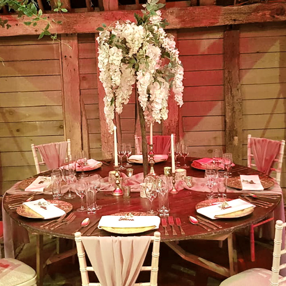 Priory barn wooden oak round table wisteria tree gold charger plates