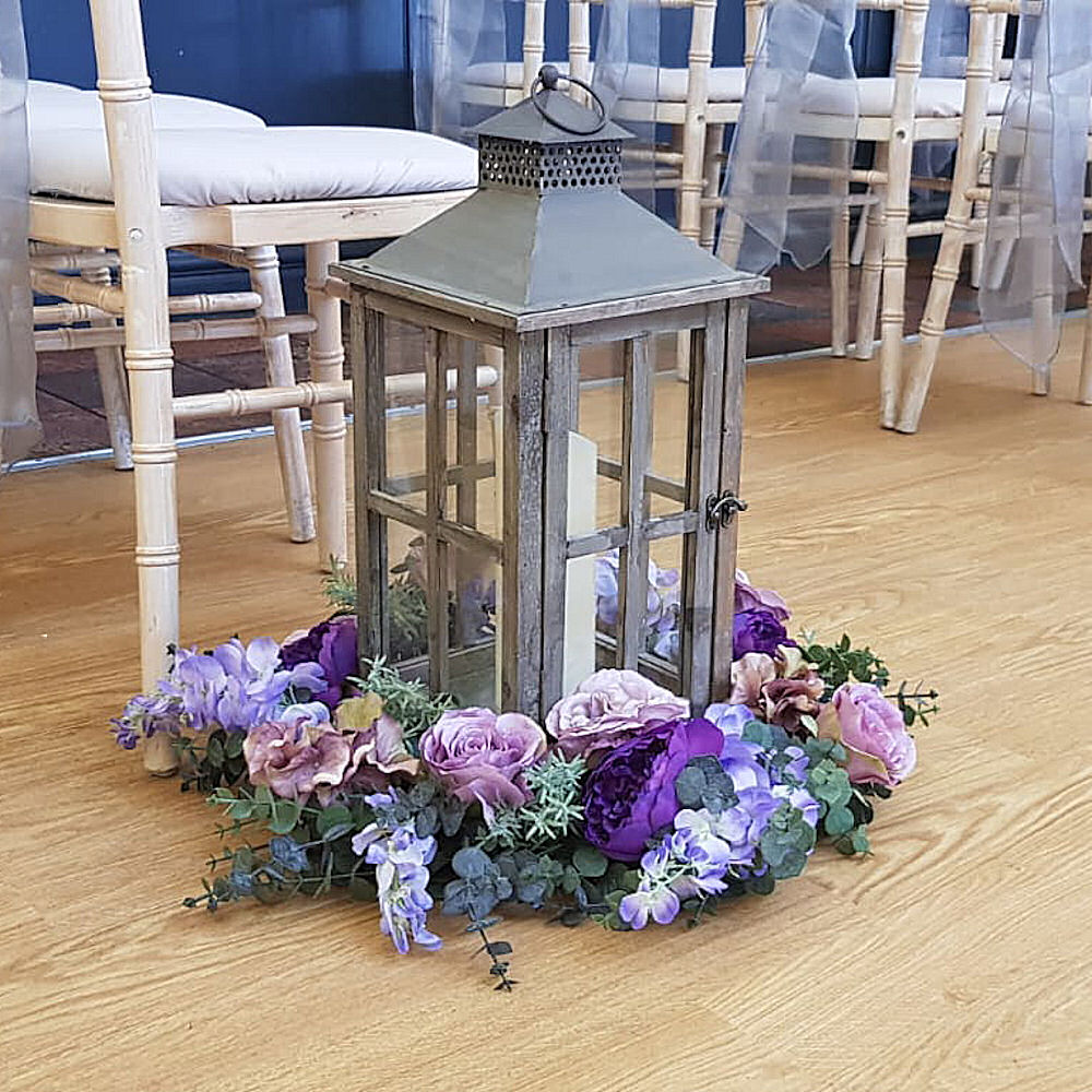 Rustic Wooden Lantern at Wedding Ceremony with Flowers