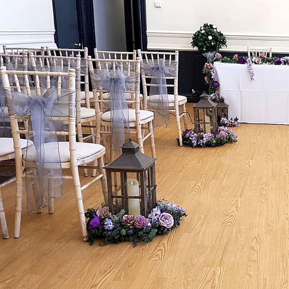 Rustic Wooden Lantern at Wedding Ceremony with Flowers