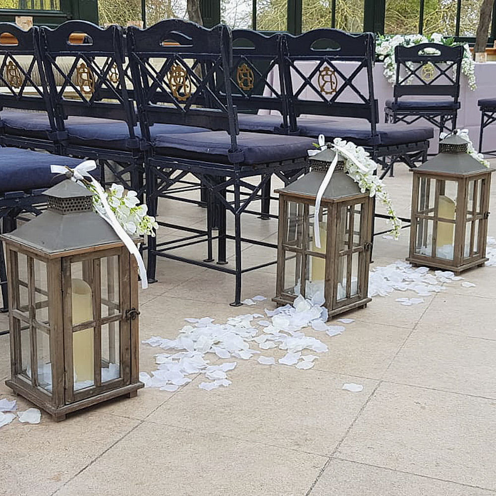 Rustic Wooden Lantern at Wedding Ceremony with Petals