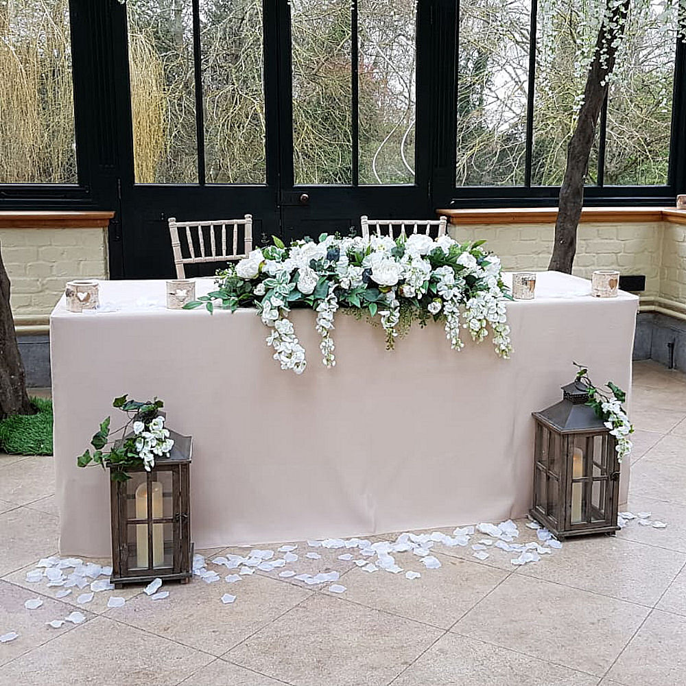 Rustic Wooden Lantern at Wedding Ceremony with Petals