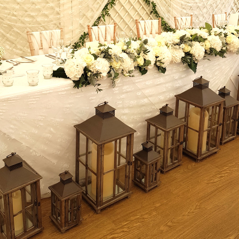 Rustic Wooden Lantern at Wedding Breakfast