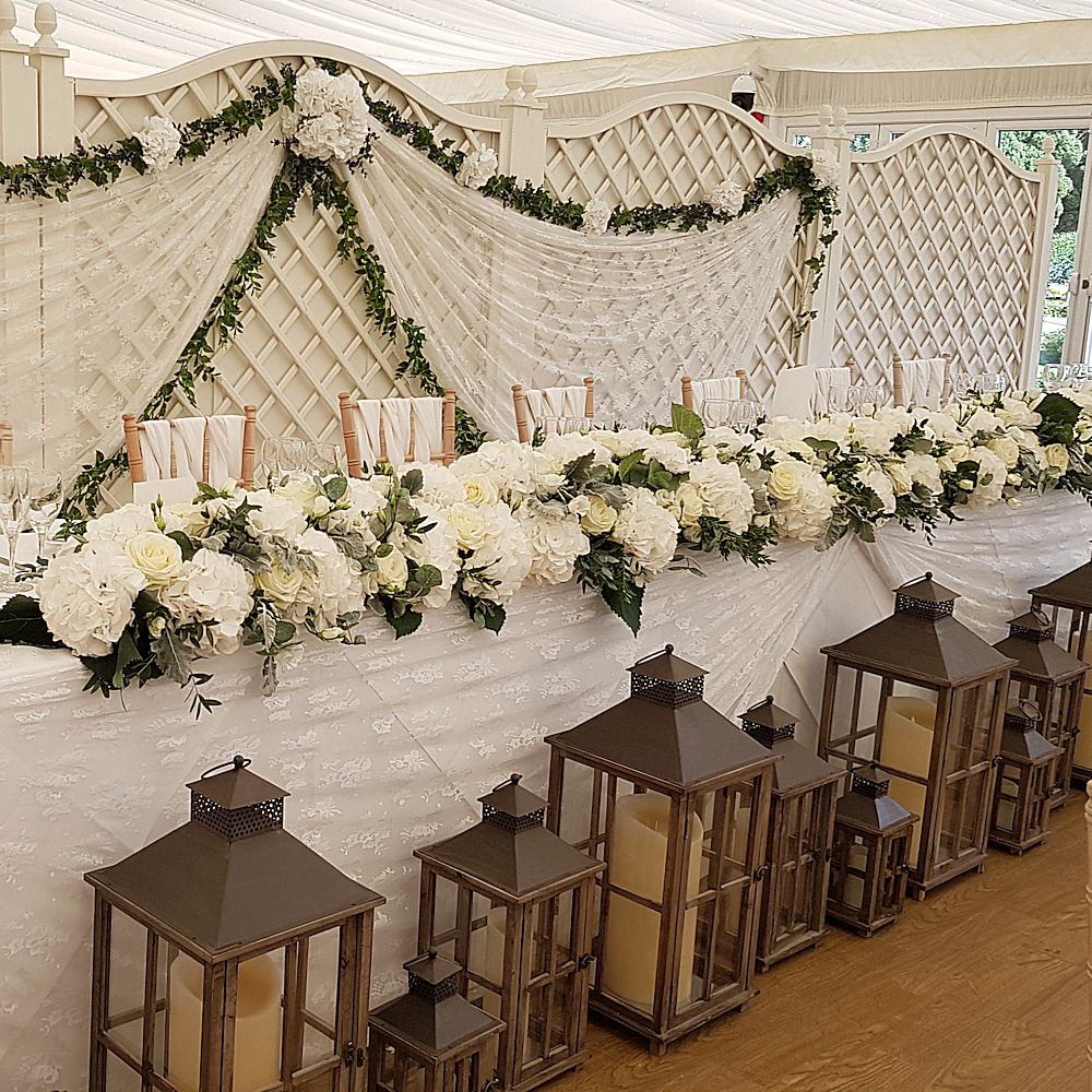 Rustic Wooden Lantern at Wedding Breakfast