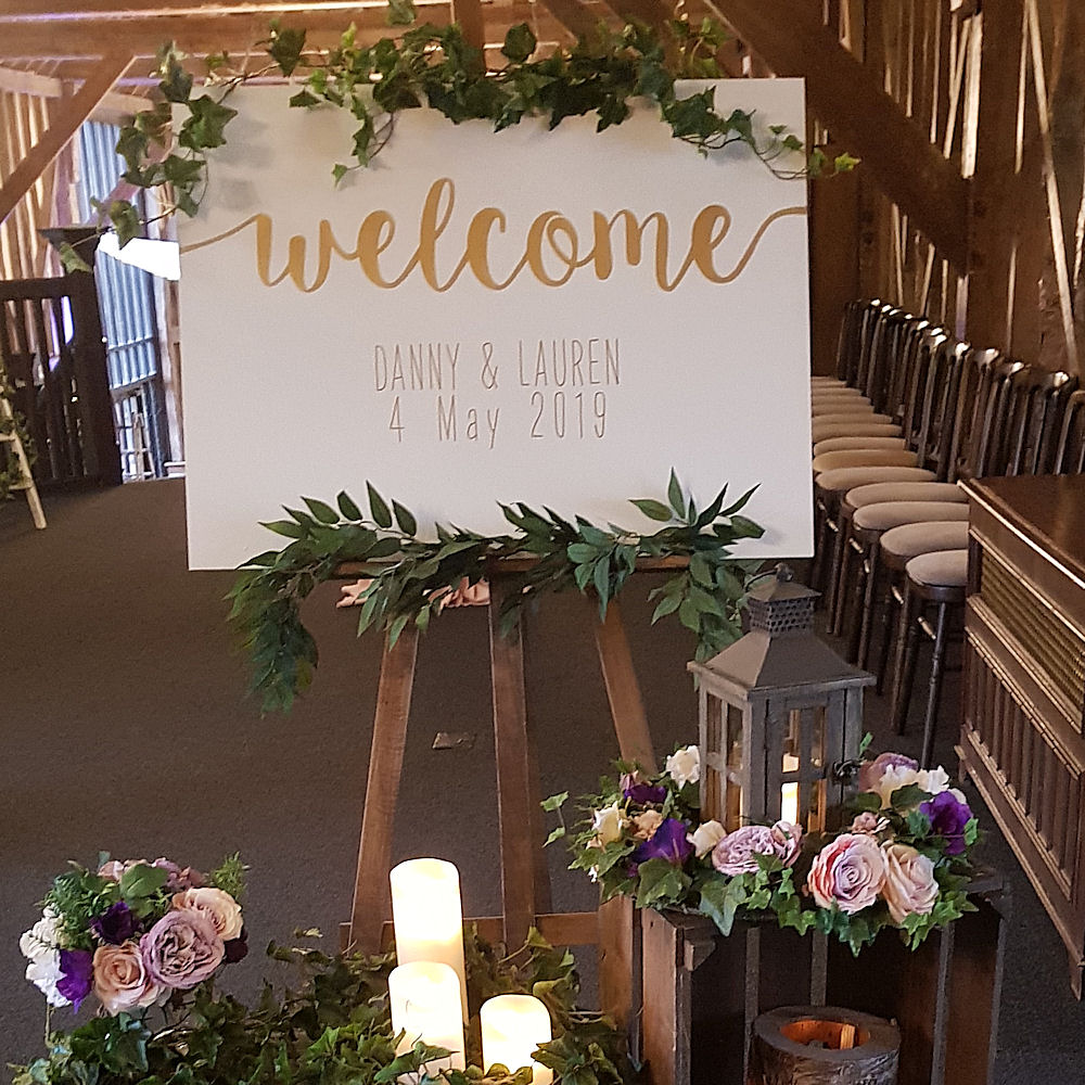 Rustic Wooden Lanterns with Rustic Welcome to our Wedding Sign